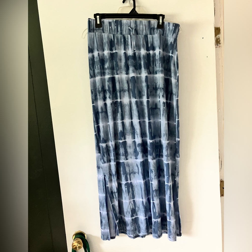 Soft, silky length skirt. 38 1/2” from top of waist to bottom.